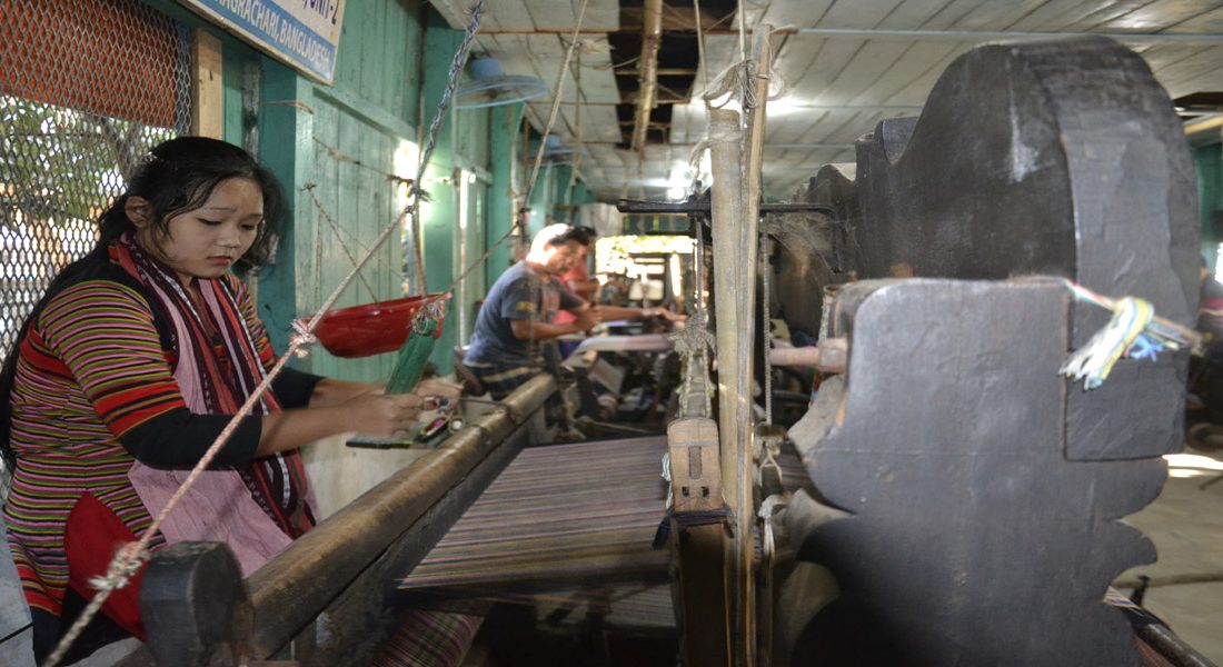 A deaf and dumb trainee at her hand-loom work at CSD's Unit-2, Dighinala, Khagrachari, CHT.